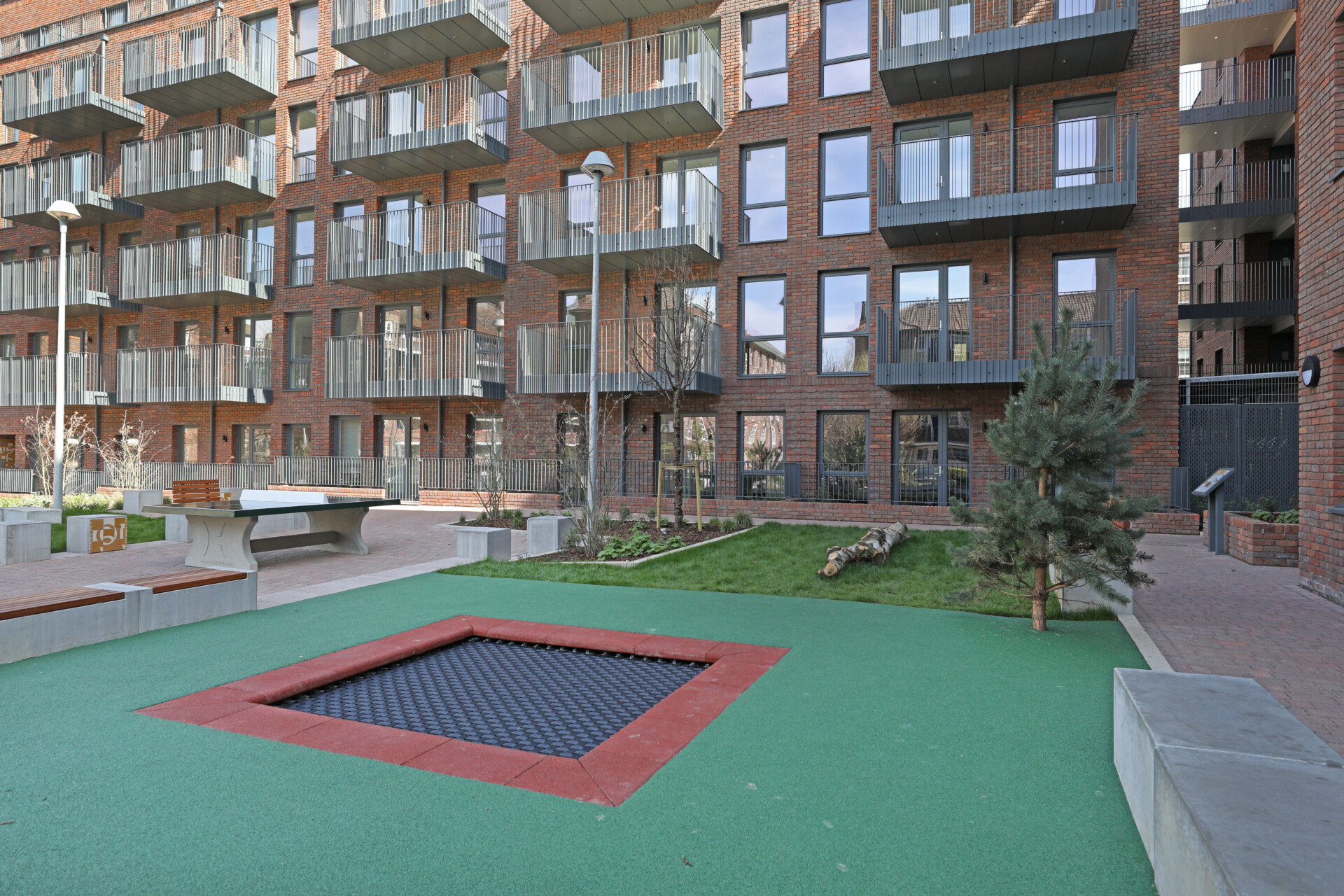 Play area and flats in Bow Bridge